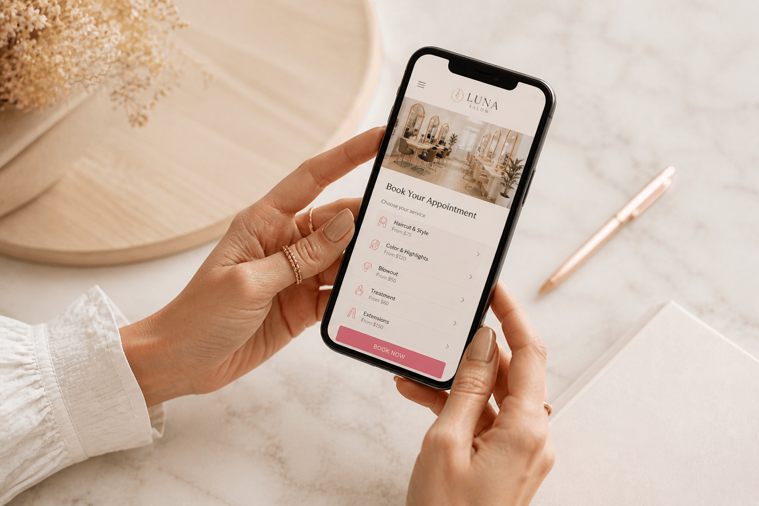Smartphone showing a clean business website booking page